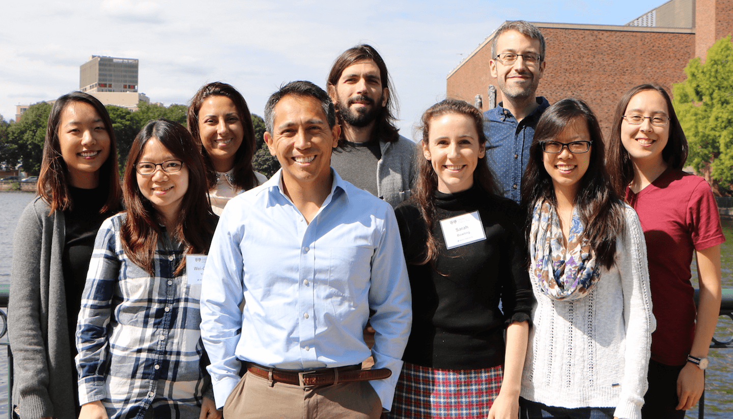 Fernando Camargo and lab outside on a sunny day