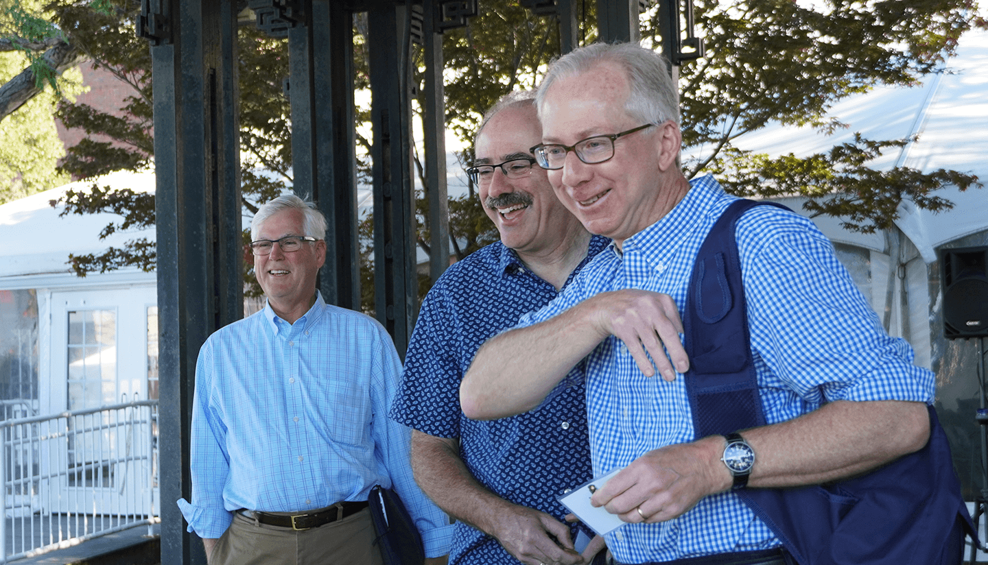 Faculty members arrive at the retreat.